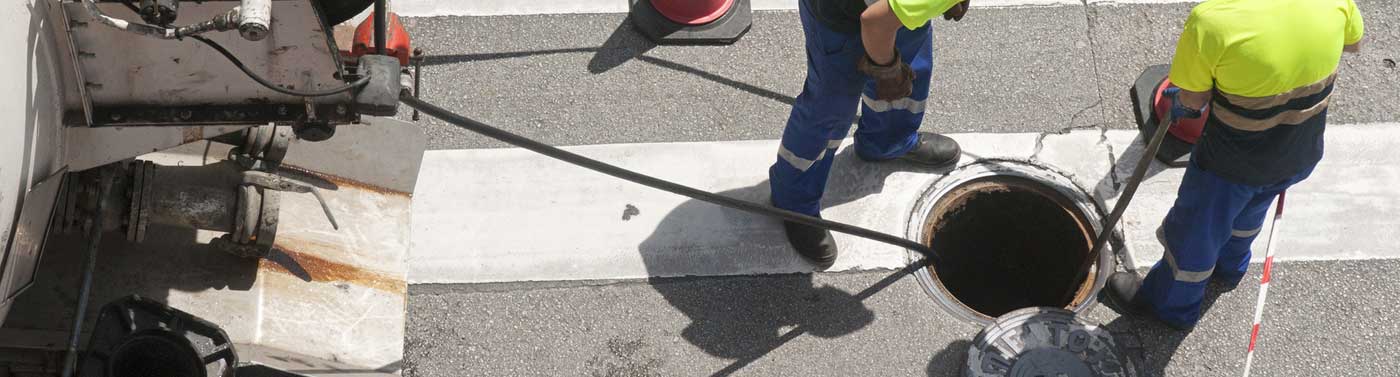 Sewer Workers in Street